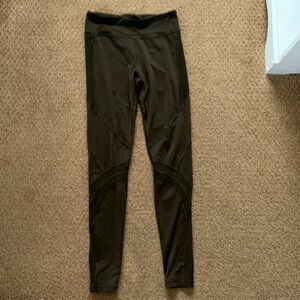 Size 12 Ivivva army green leggings with pockets and mesh details!